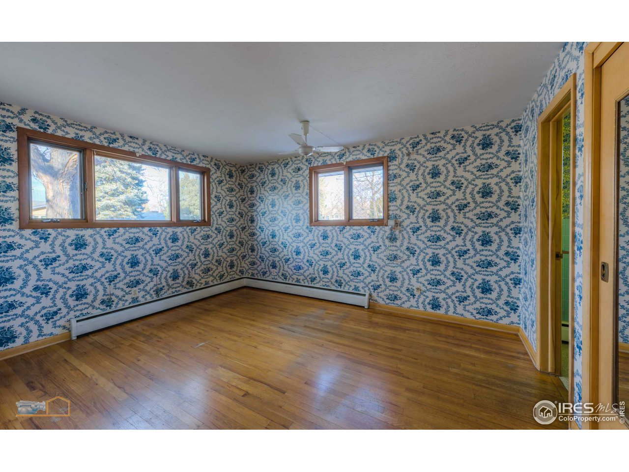 2490 Glenwood Drive Boulder, CO 80304 - Photo 14 of 25 Primary bedroom with hardwood floors