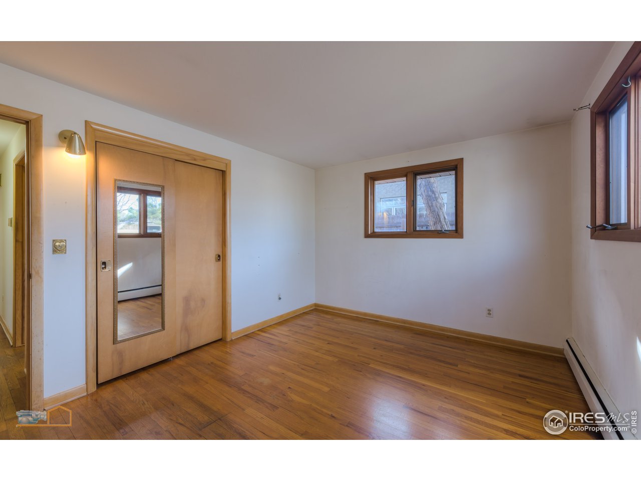2490 Glenwood Drive Boulder, CO 80304 - Photo 16 of 25 Bedroom #2 with hardwood floors