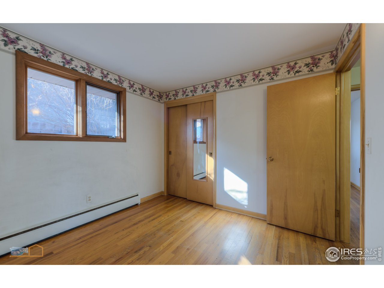 2490 Glenwood Drive Boulder, CO 80304 - Photo 18 of 25 Bedroom #3 with hardwood floors