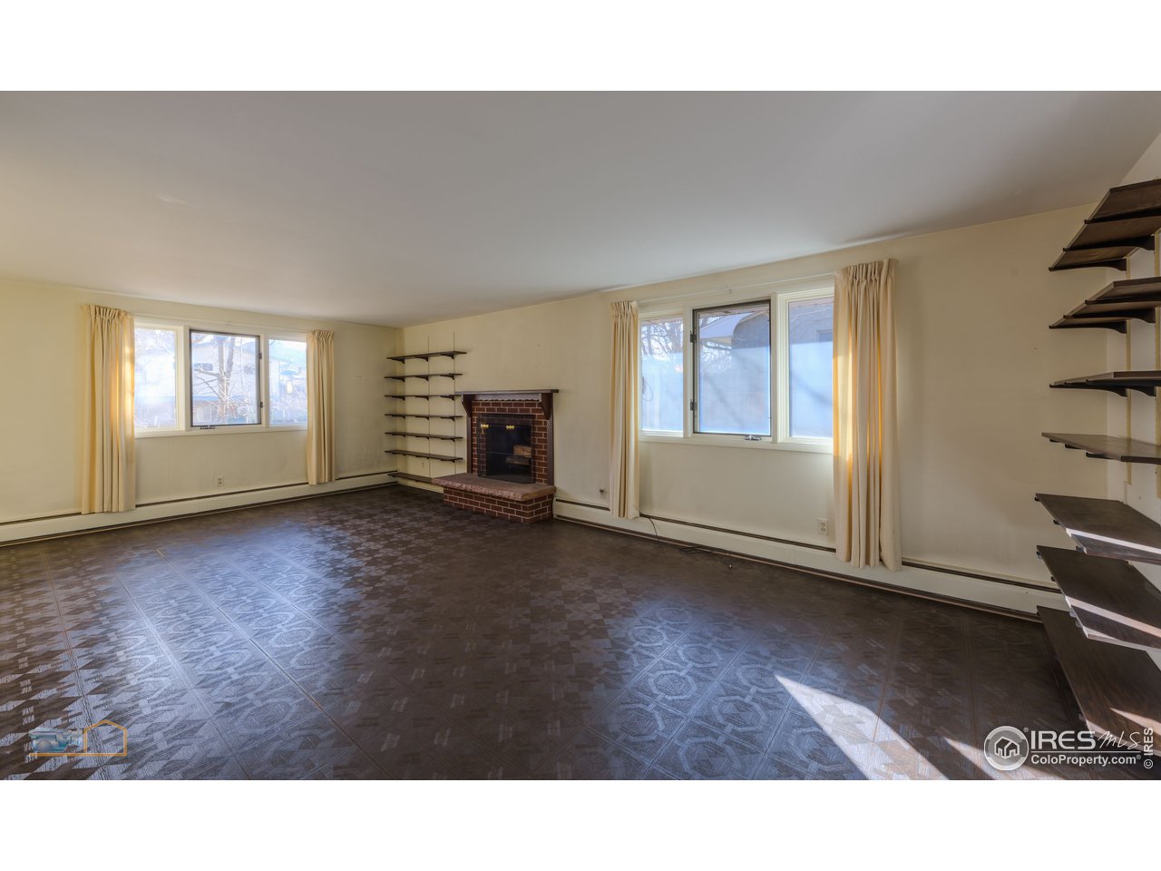 2490 Glenwood Drive Boulder, CO 80304 - Photo 3 of 25 Spacious Living Room with wood-burning fireplace