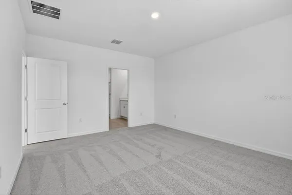 an empty room with an entryway