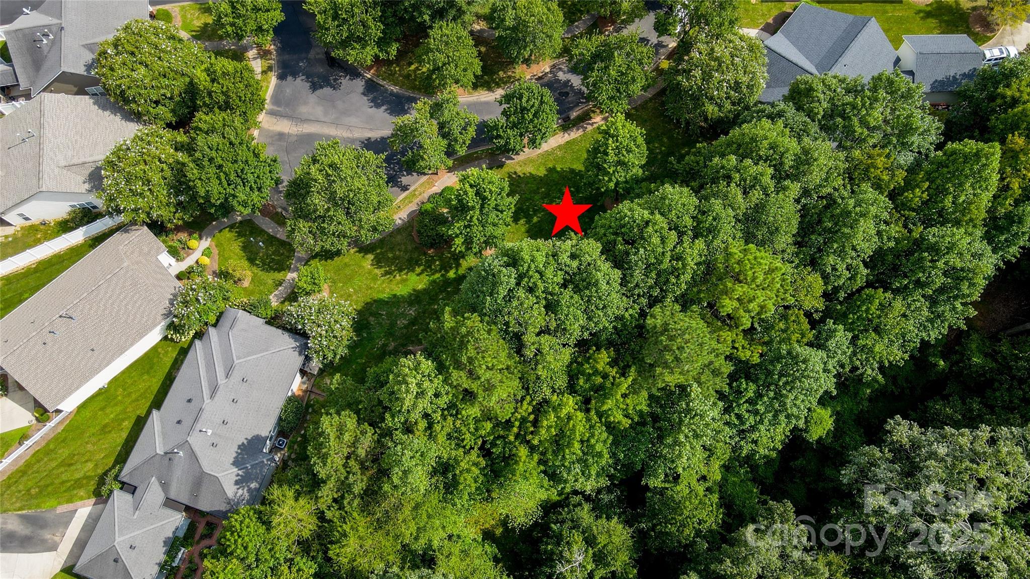 13004 Park Crescent Circle, Unit 85 Pineville, NC 28134 - Photo 5 of 9 an aerial view of a house with a yard and garden