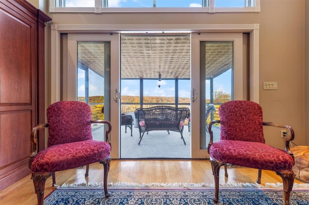 195 Injun Hollow Road Haddam, CT 06424 - Photo 11 of 40 Slider to Sun Porch in Living Room