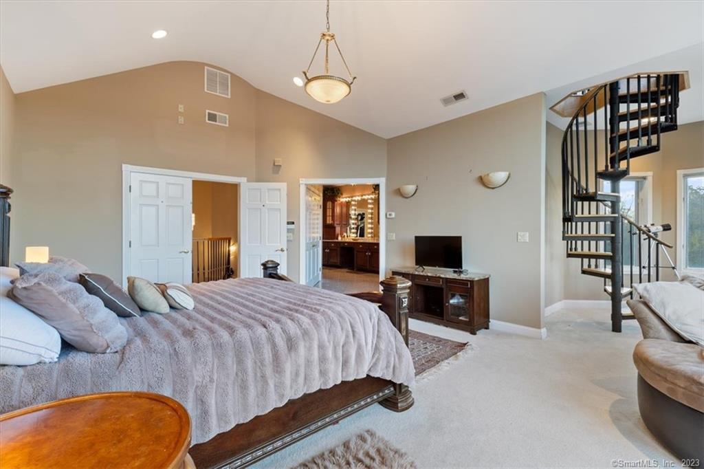 195 Injun Hollow Road Haddam, CT 06424 - Photo 22 of 40 Master Bedroom Suite with spiral staircase to Lookout