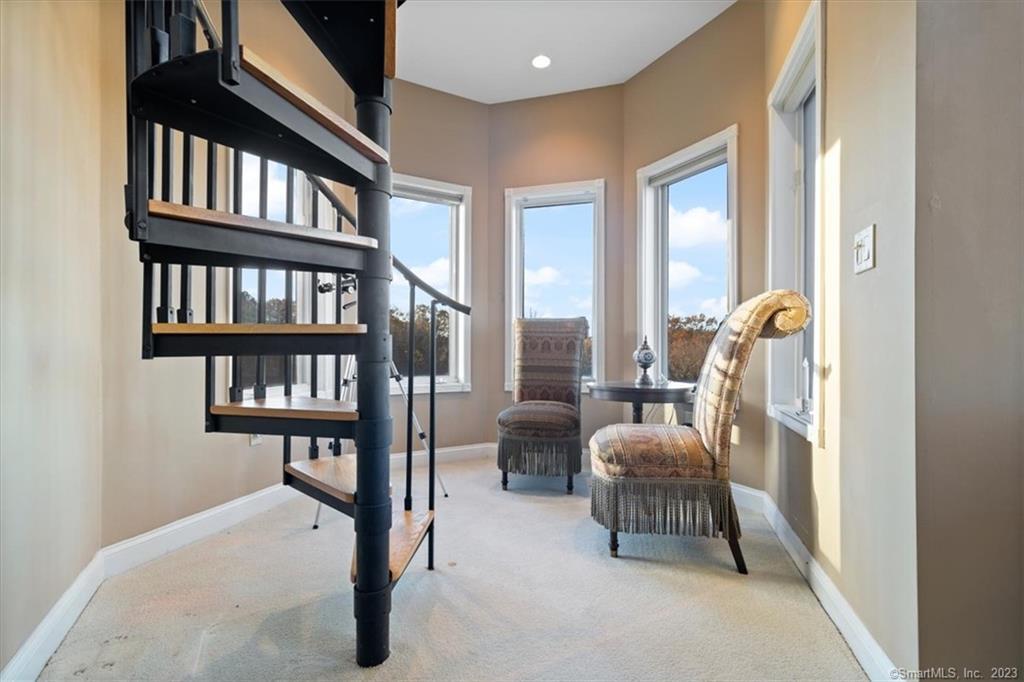 195 Injun Hollow Road Haddam, CT 06424 - Photo 28 of 40 Master Bedroom nook with spiral stairs to Lookout