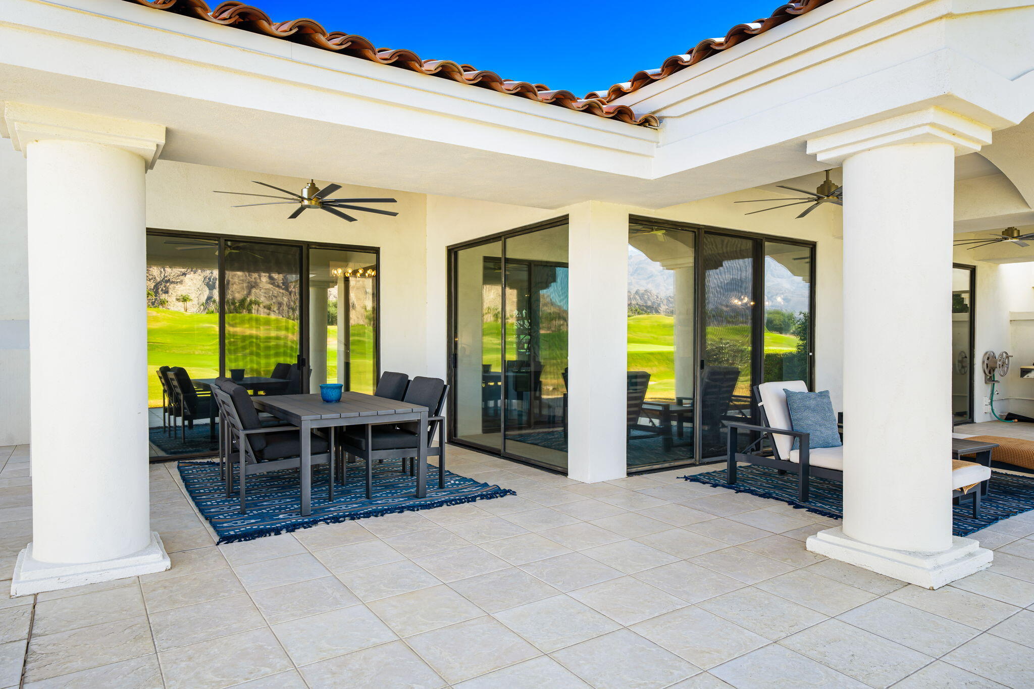 54885 Inverness Way La Quinta, CA 92253 - Photo 17 of 53 a view of a dining room with furniture and a window