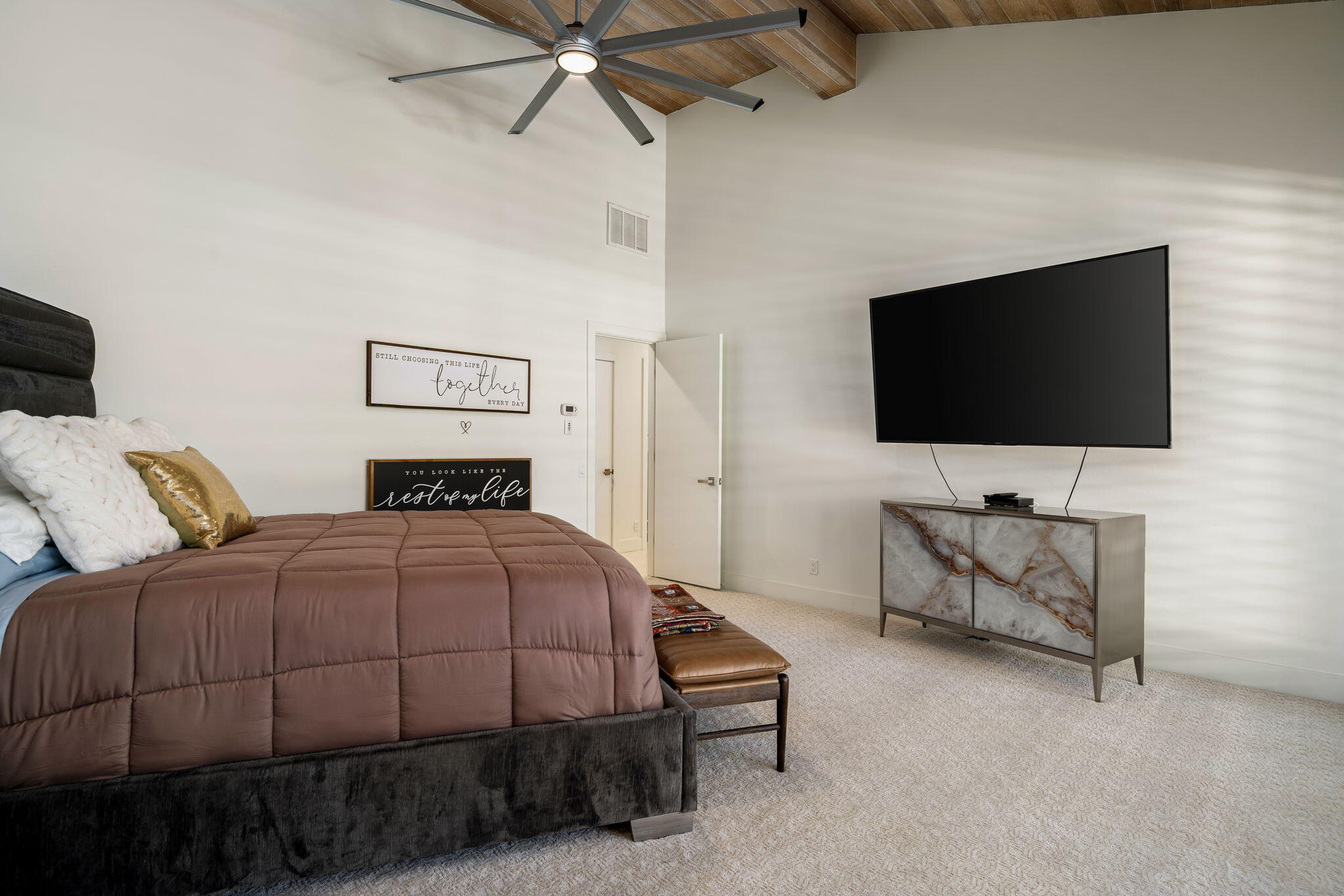 54885 Inverness Way La Quinta, CA 92253 - Photo 41 of 53 a bedroom with a bed and a flat screen tv