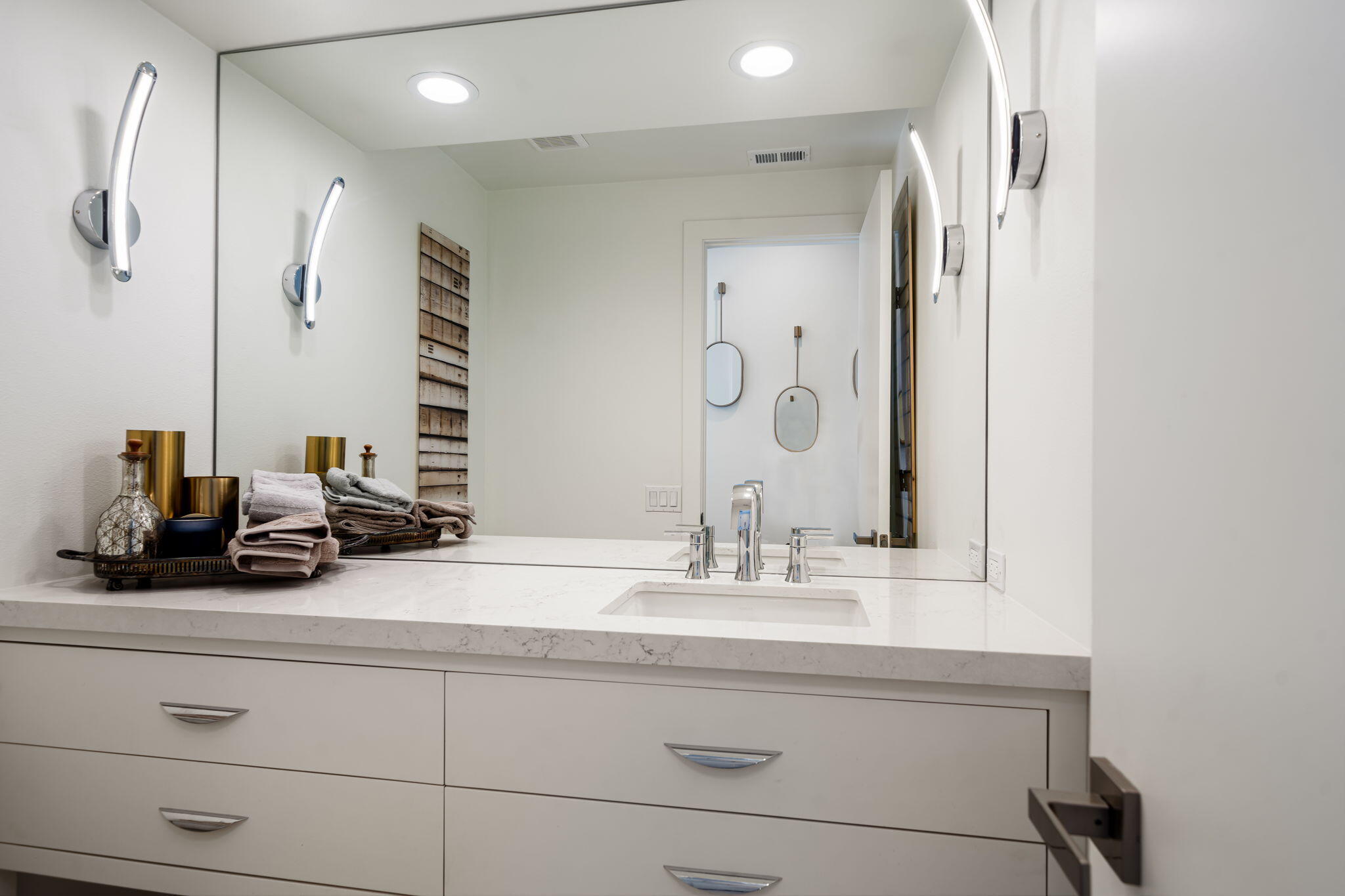 54885 Inverness Way La Quinta, CA 92253 - Photo 48 of 53 a bathroom with a sink double vanity and a mirror