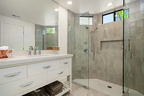 a kitchen with a sink a washer and dryer