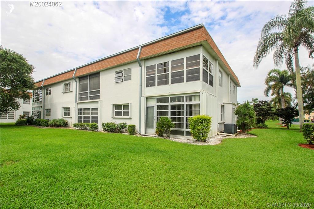 2950 Southeast Ocean Boulevard, Unit 101 Stuart, FL 34996 - Photo 22 of 29 a view of a house with backyard