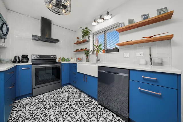 a kitchen with a cabinets and appliances