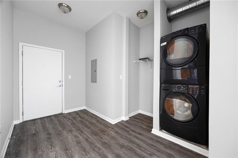 5300 Peachtree Road, Unit 2309 Chamblee, GA 30341 - Photo 17 of 44 a room with wooden floor and window