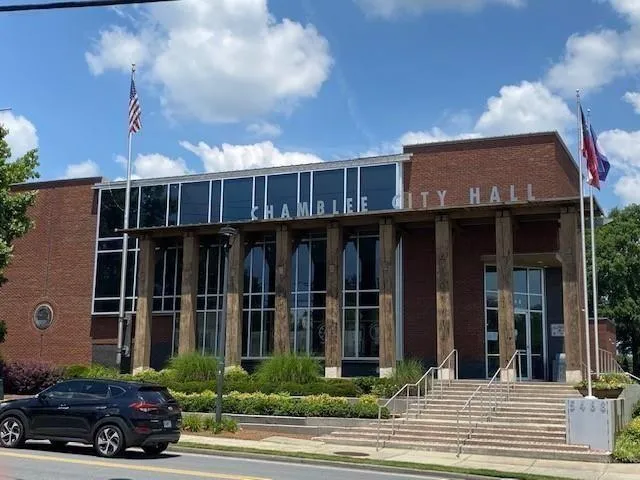a view of a house and a yard