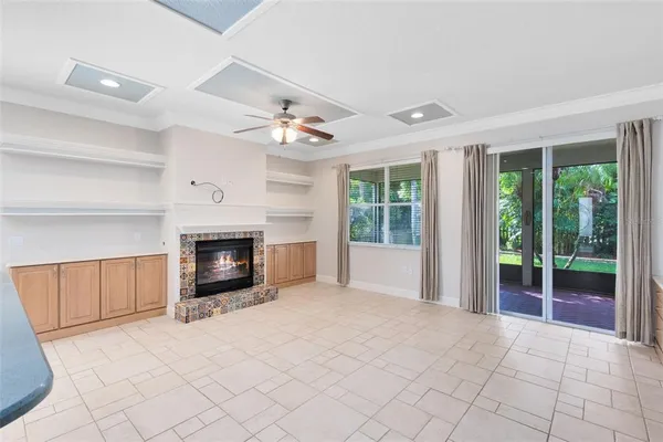 a view of an empty room with a fireplace