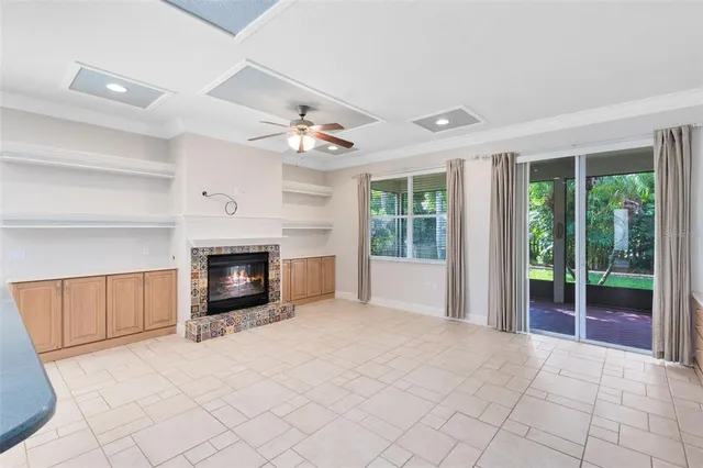 a view of an empty room with a fireplace