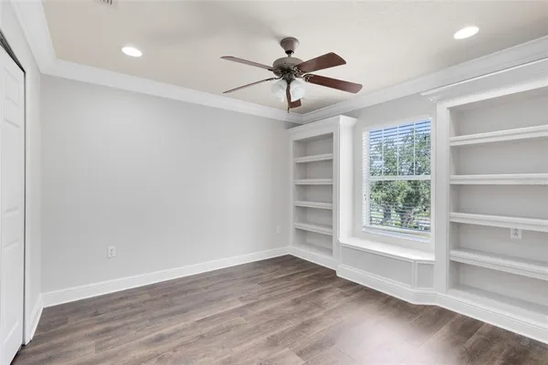 a view of room window and wooden floor