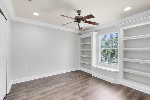 a view of room window and wooden floor