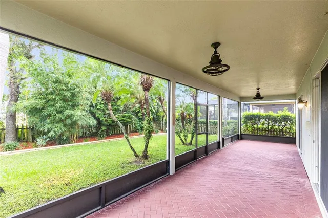 a view of a garden with an outdoor seating