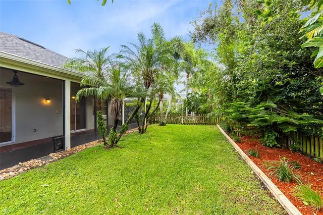 a view of a backyard with plants