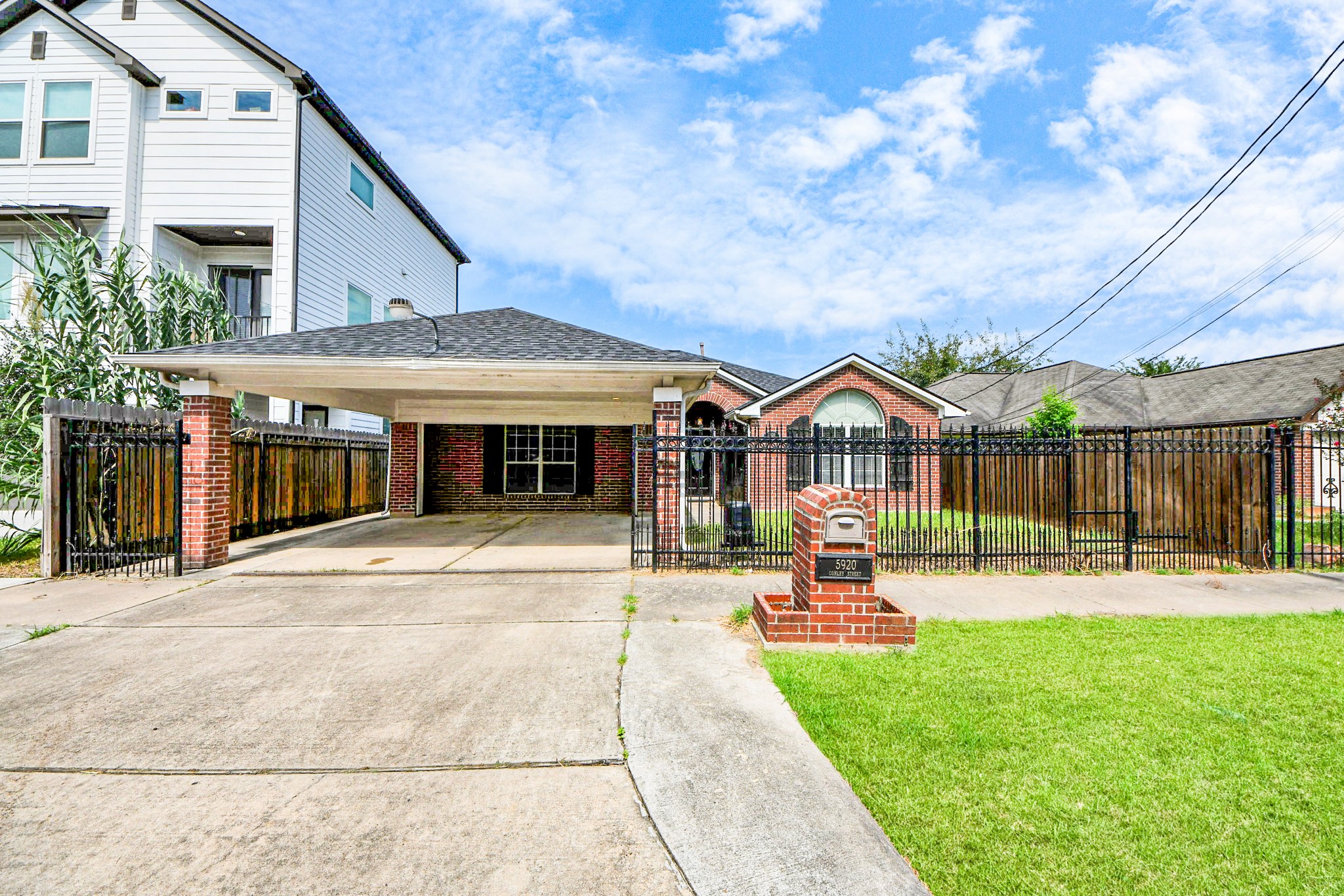 5920 Conley Street Houston, TX 77021 - Photo 1 of 38 a patio with a table and chairs and potted plants