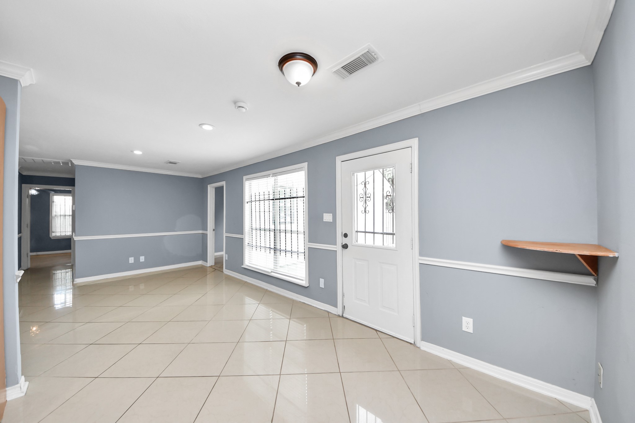 5920 Conley Street Houston, TX 77021 - Photo 21 of 38 a view of an empty room with a window