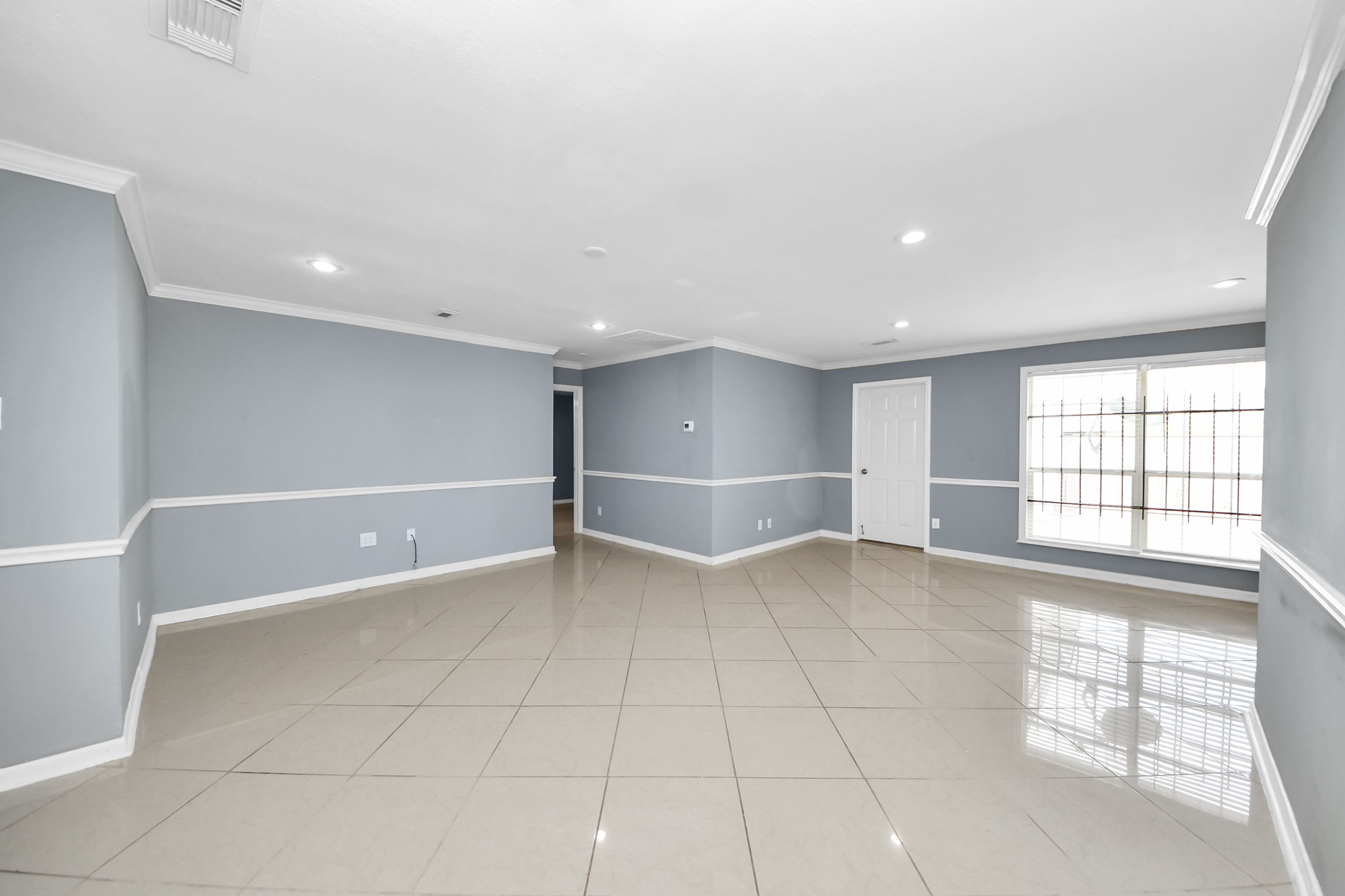 5920 Conley Street Houston, TX 77021 - Photo 26 of 38 a view of an empty room with a window