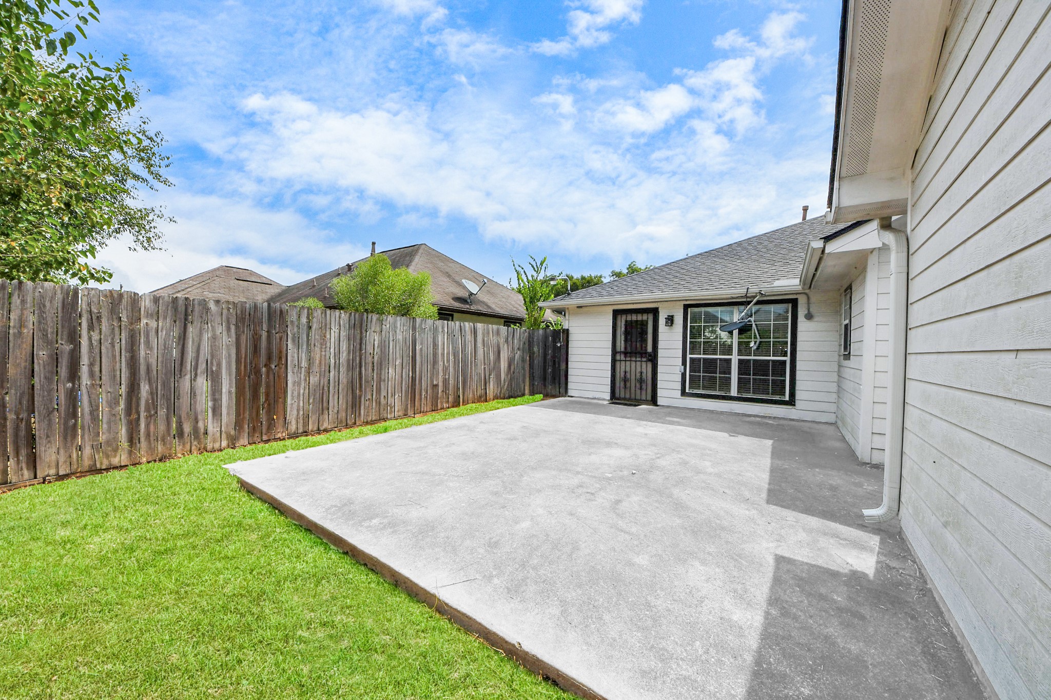 5920 Conley Street Houston, TX 77021 - Photo 34 of 38 a view of backyard with wooden fence