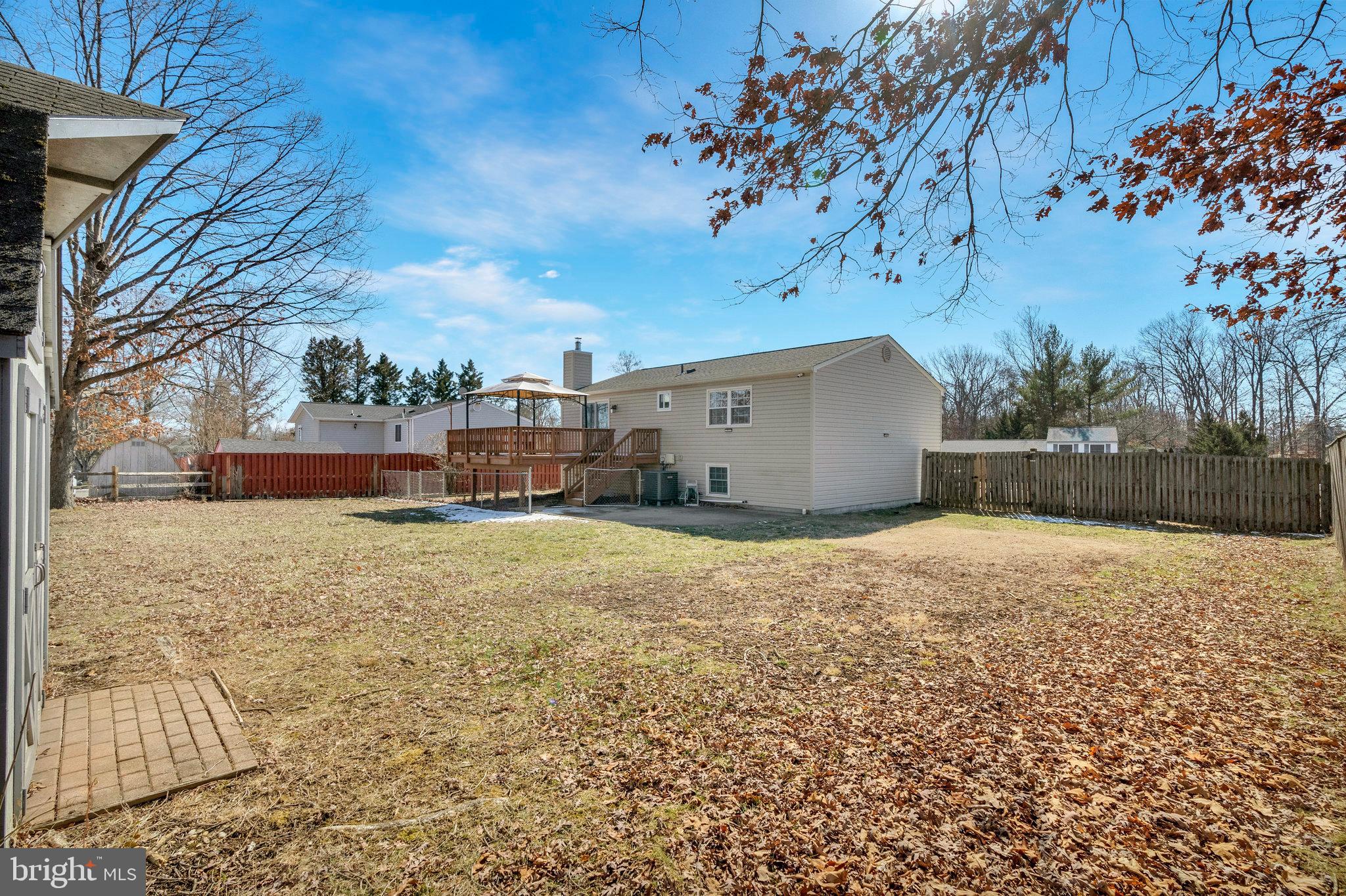 4522 Cub Run Road Chantilly, VA 20151 - Photo 18 of 19 a backyard of a house with lots of green space