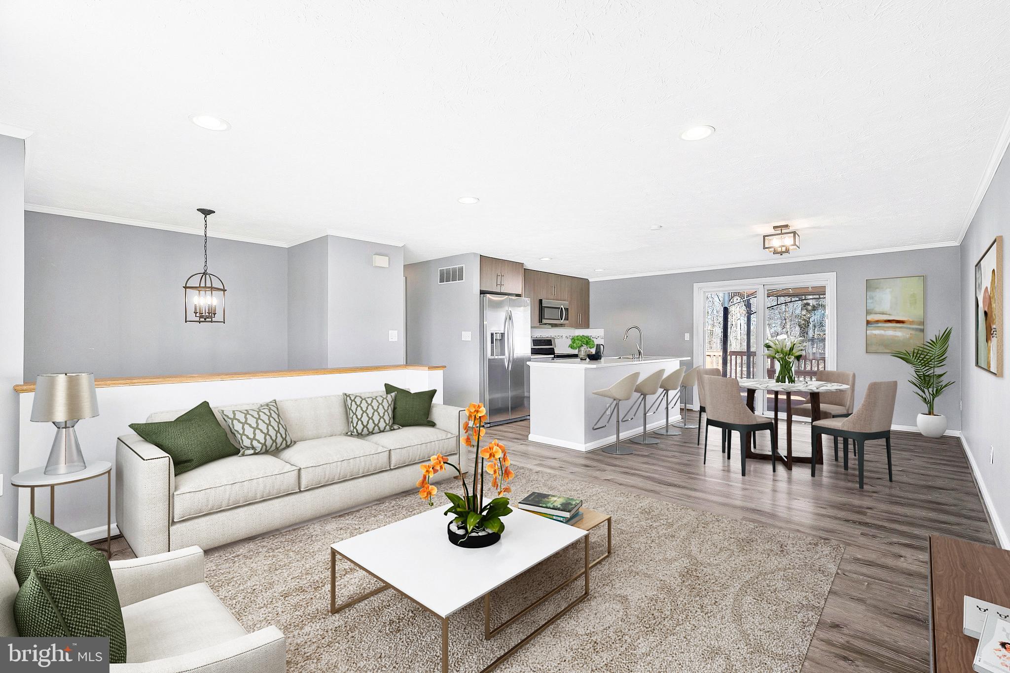 4522 Cub Run Road Chantilly, VA 20151 - Photo 2 of 19 a living room with furniture and view of kitchen