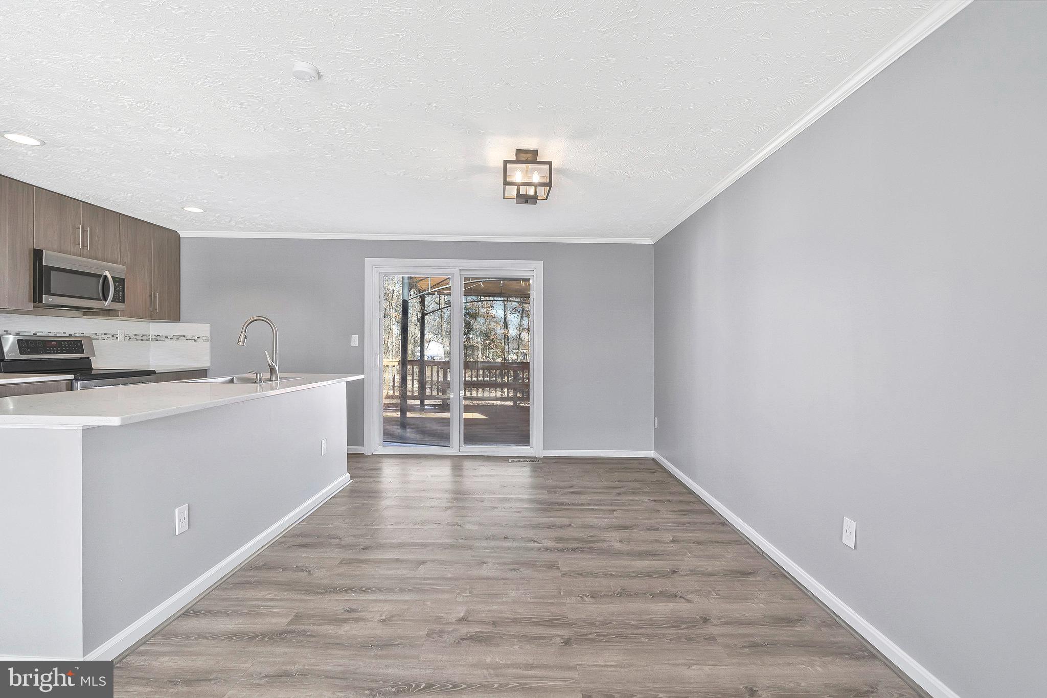4522 Cub Run Road Chantilly, VA 20151 - Photo 9 of 19 a view of a kitchen with electric equipment