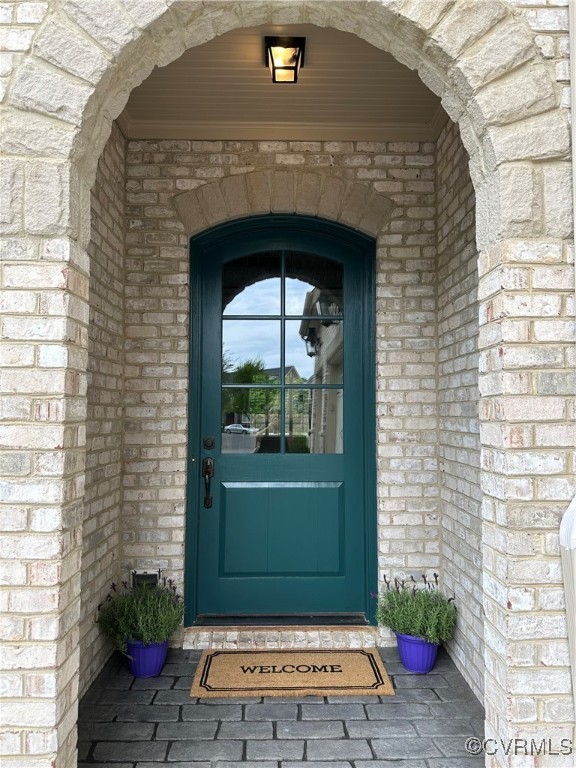 2392 Bel Crest Circle Midlothian, VA 23113 - Photo 3 of 50 a front view of a house with a yard