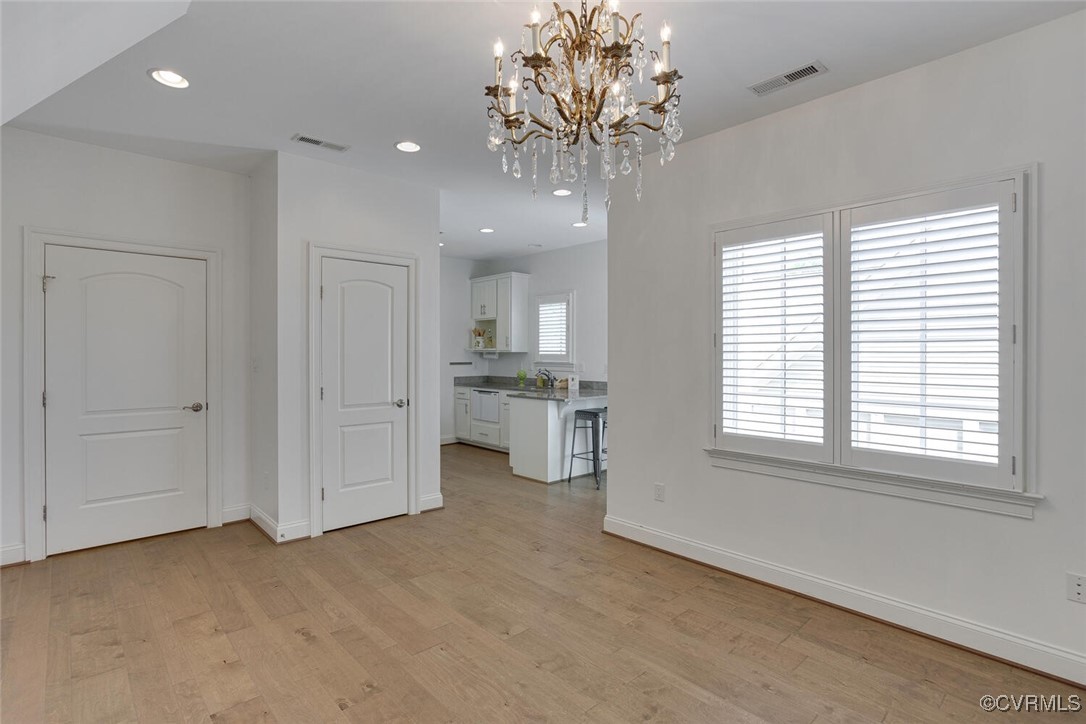 2392 Bel Crest Circle Midlothian, VA 23113 - Photo 33 of 50 a view of a big room with windows and chandelier