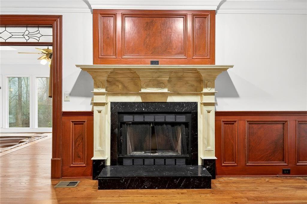 5523 Bahia Mar Circle Smoke Rise, GA 30087 - Photo 38 of 69 a living room with a fireplace in it