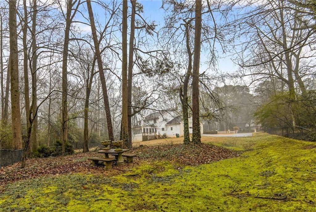 5523 Bahia Mar Circle Smoke Rise, GA 30087 - Photo 55 of 69 a view of swimming pool with a yard