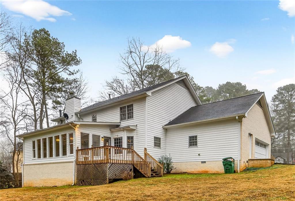 5523 Bahia Mar Circle Smoke Rise, GA 30087 - Photo 61 of 69 a view of a yard with a house