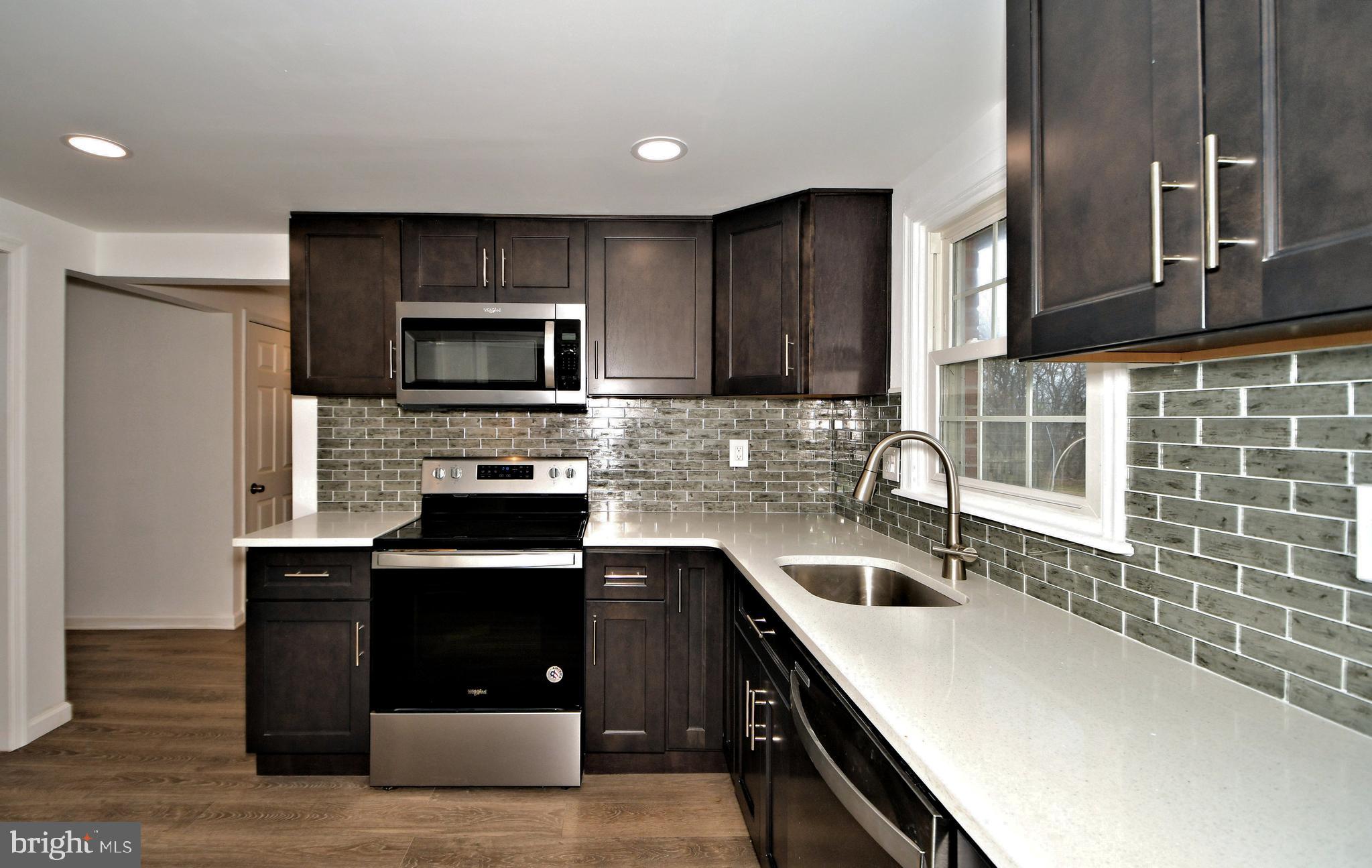 2450 Rhoads Road Gilbertsville, PA 19525 - Photo 13 of 47 Quartz Countertops/Tiled Backsplash