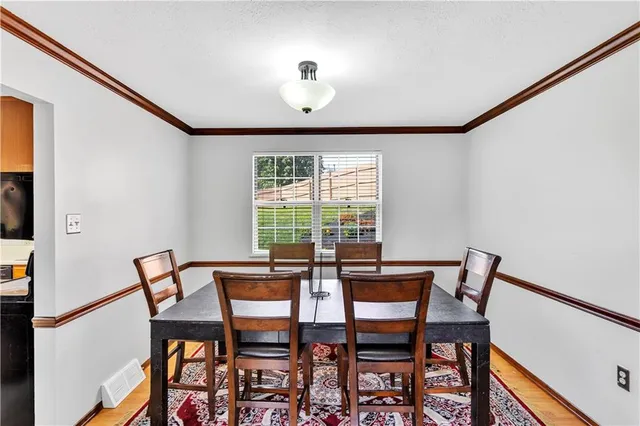 a living room with furniture windows and a fireplace
