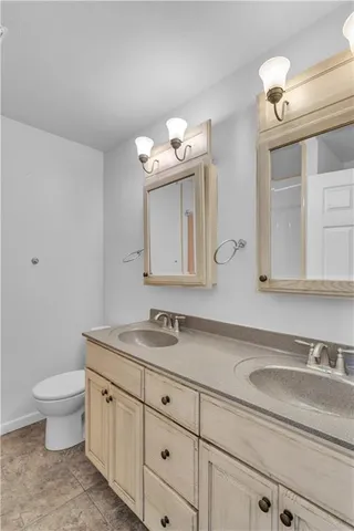 a bedroom with a bed and a table in it