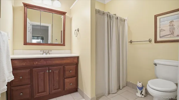 a view of a wooden deck with a bench