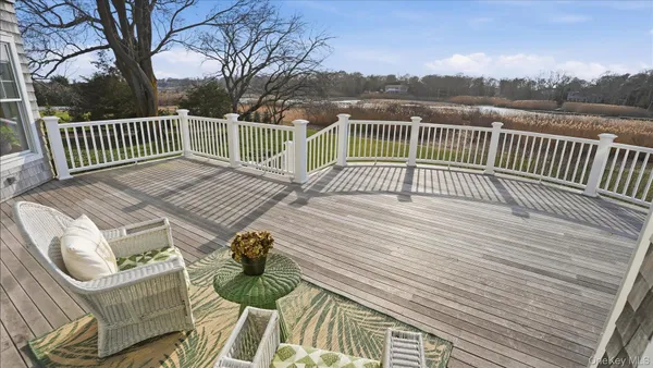 a view of a lake with a deck