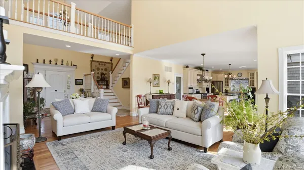 a living room with furniture and a rug
