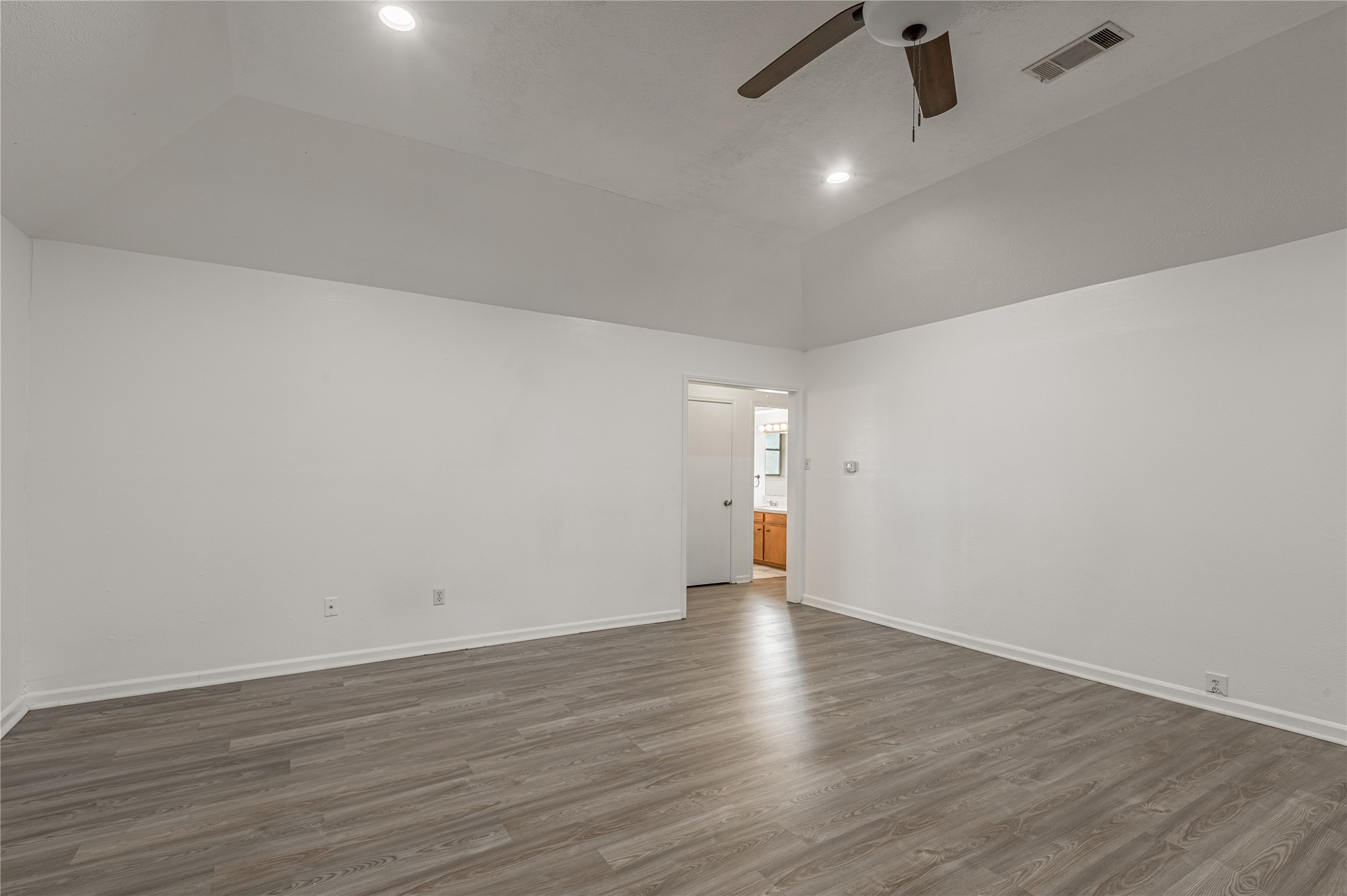 114 Timberline Drive Huntsville, TX 77320 - Photo 11 of 26 wooden floor in an empty room