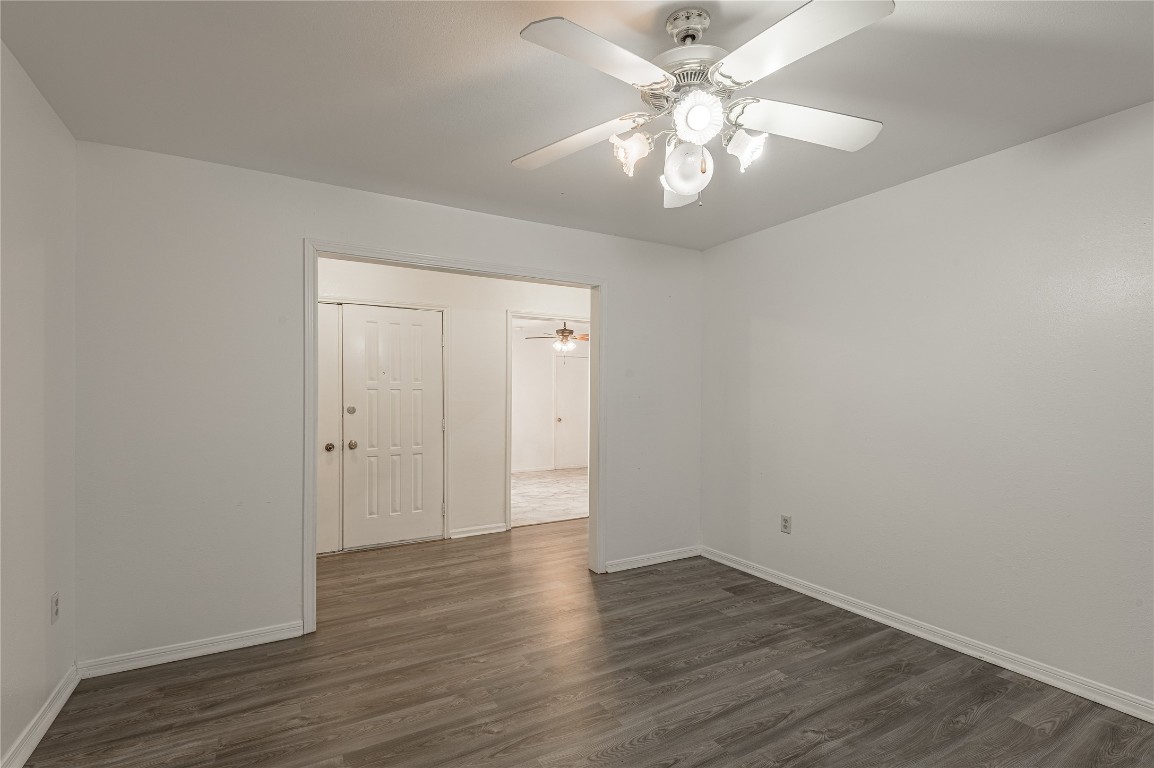 114 Timberline Drive Huntsville, TX 77320 - Photo 13 of 26 a view of an empty room with wooden floor