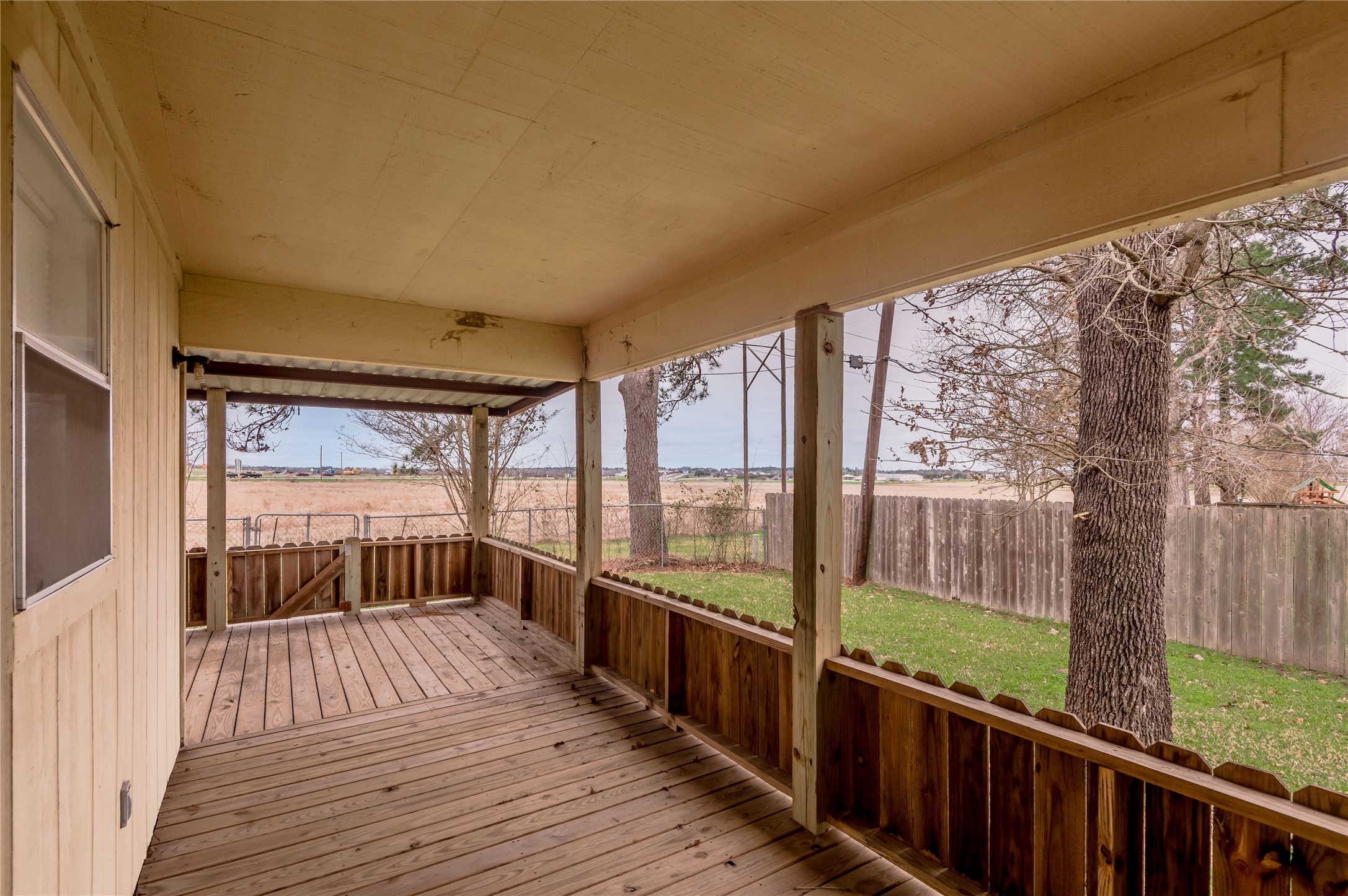 114 Timberline Drive Huntsville, TX 77320 - Photo 23 of 26 a view of a balcony with wooden floor
