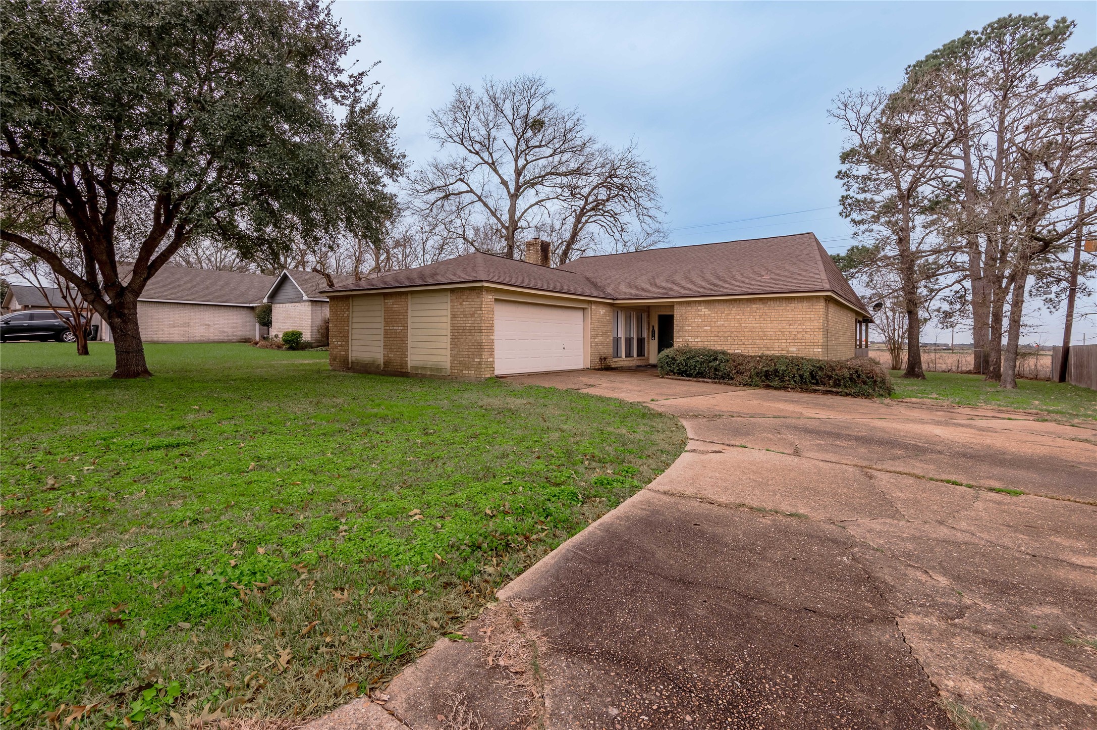 114 Timberline Drive Huntsville, TX 77320 - Photo 26 of 26 a view of a yard with a house