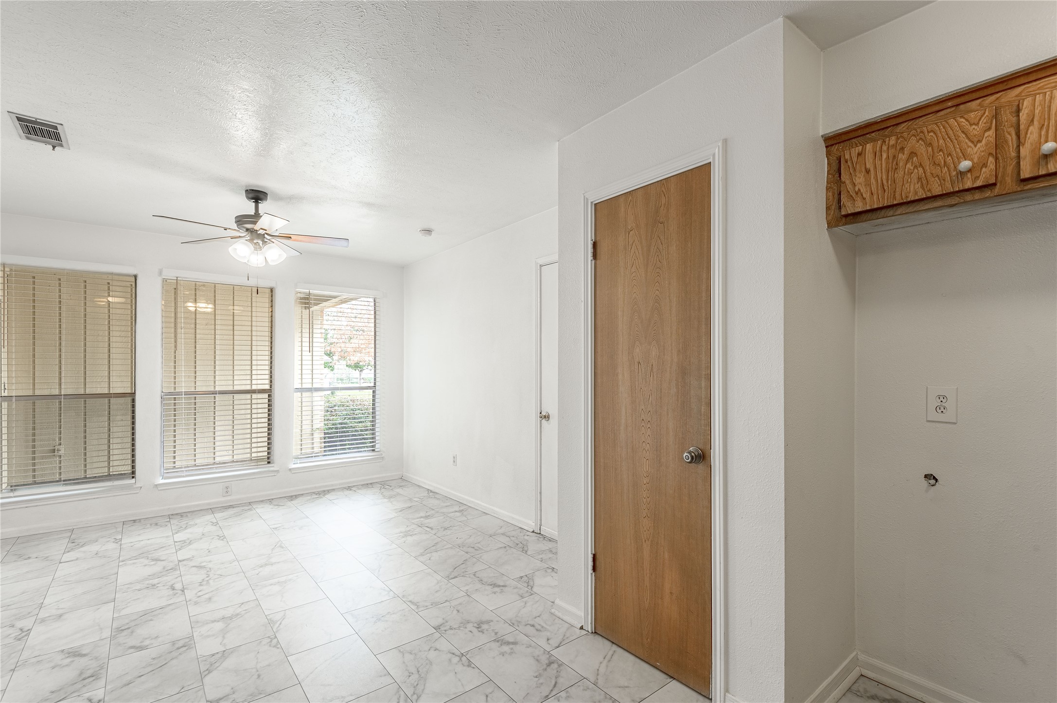 114 Timberline Drive Huntsville, TX 77320 - Photo 8 of 26 a view of an empty room with a window