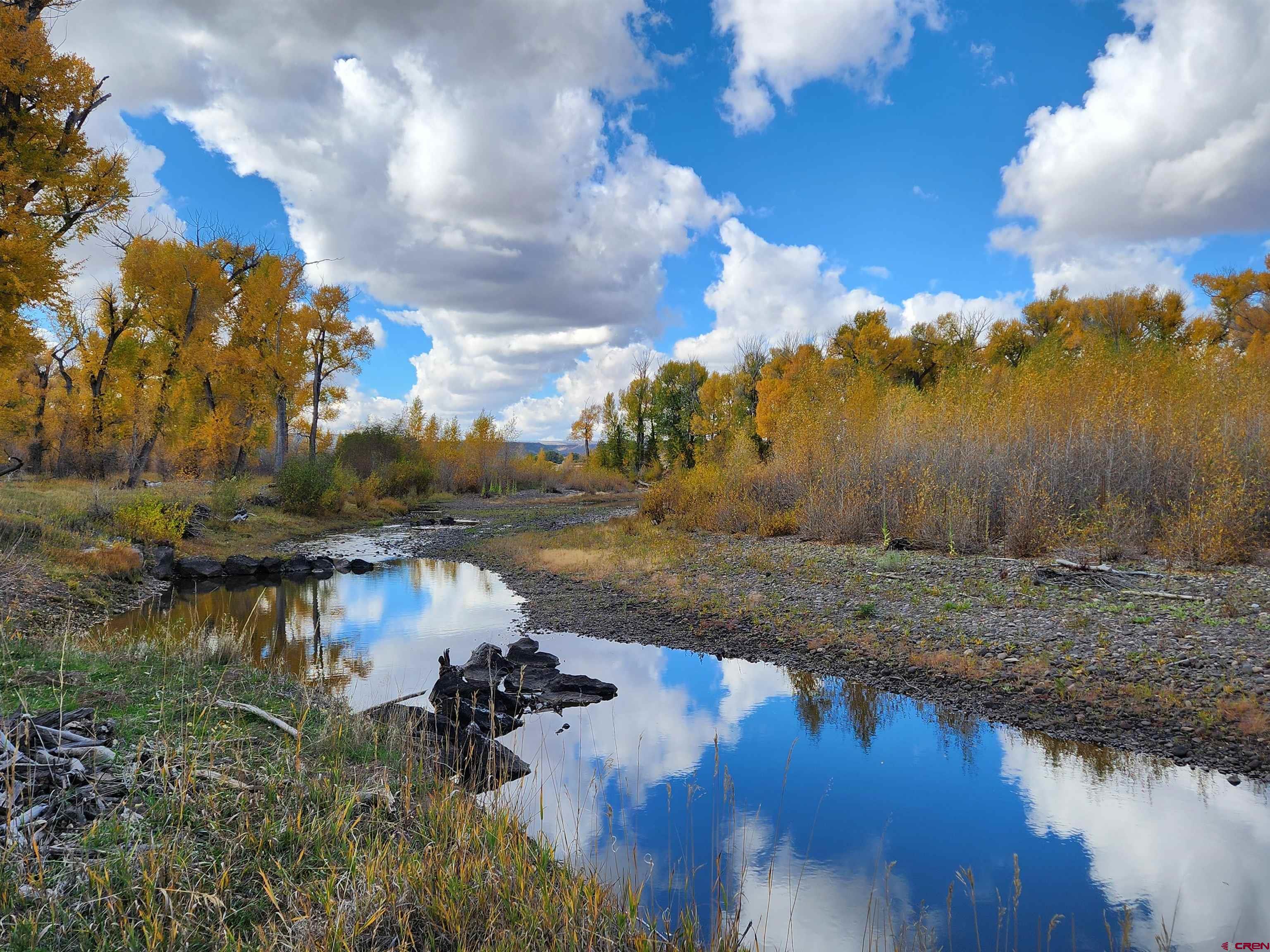 12753 13.5 Road Antonito, CO 81120 - Photo 34 of 39 a view of a lake view with houses in back