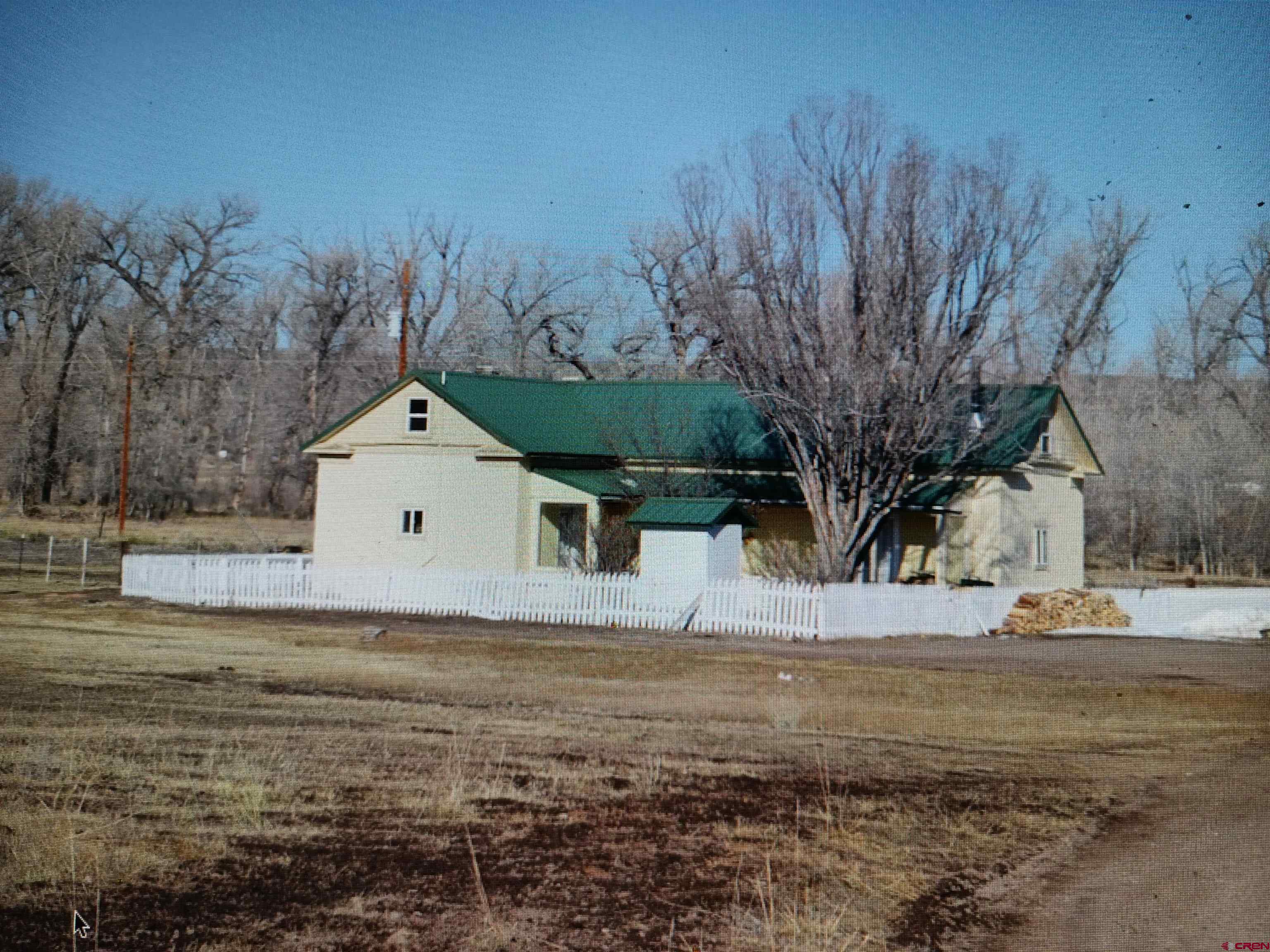 12753 13.5 Road Antonito, CO 81120 - Photo 10 of 39 a view of a yard with a house