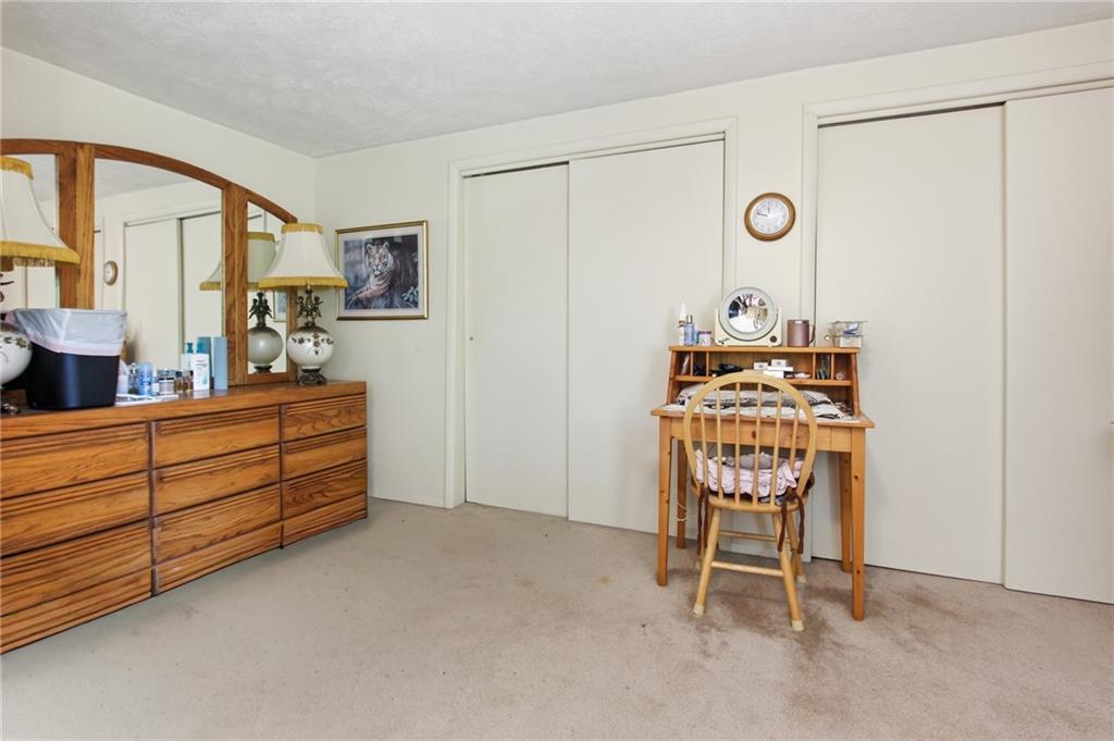 776 Fraction Road West Finley, PA 15377 - Photo 28 of 43 a room with a chair and a dresser in it