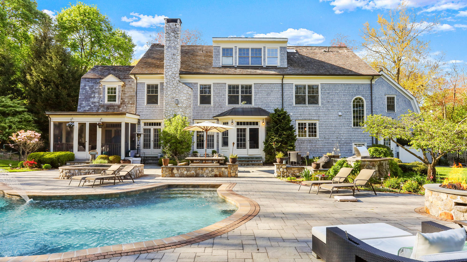a house view with sitting space and garden space